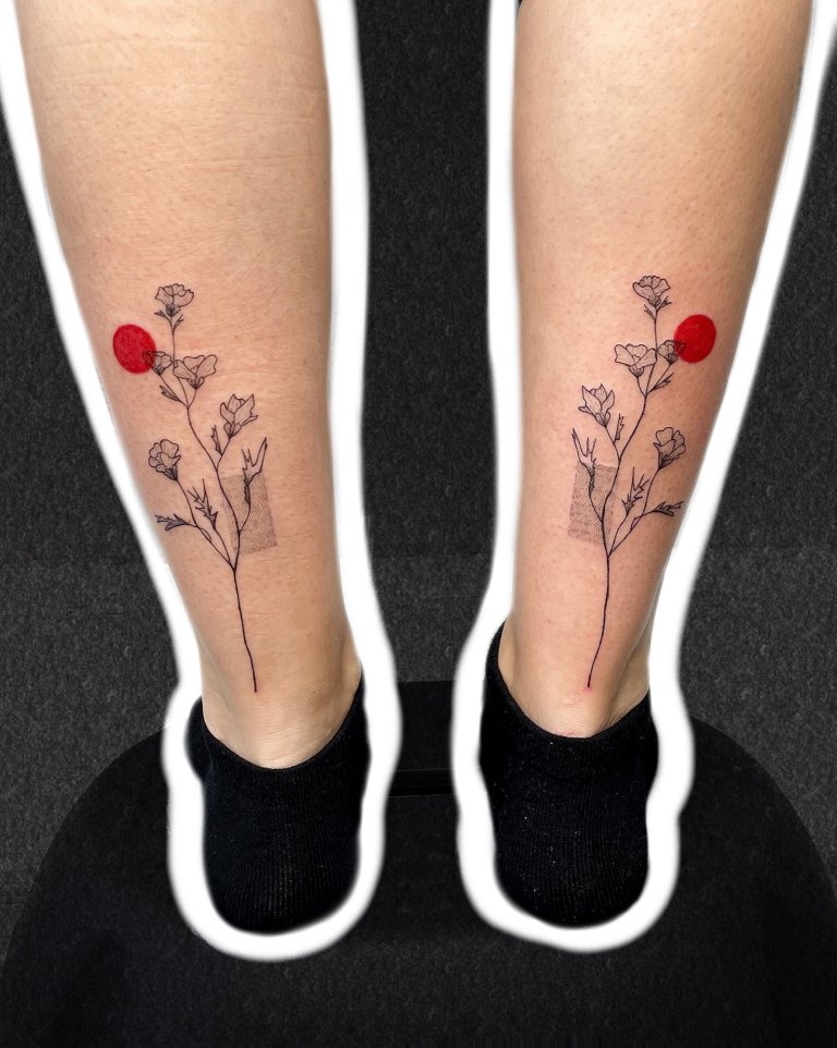 Matching poppies on both calves
