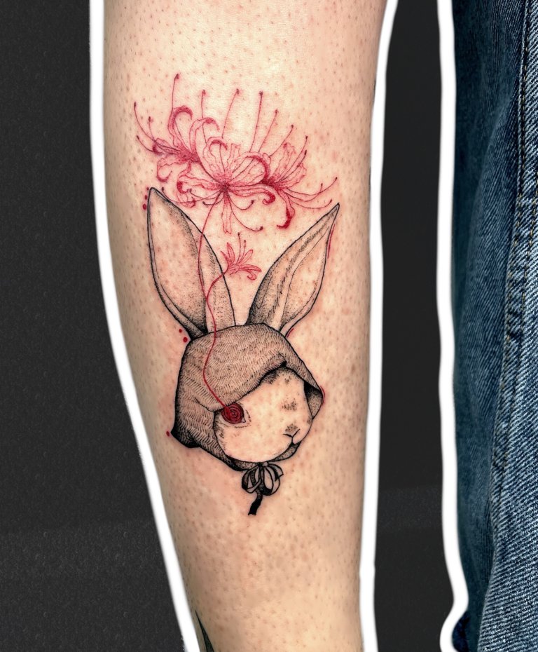 Bunny with spider lilies, calf tattoo by Alexandra S.