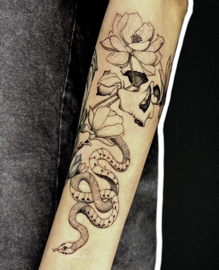 Snake, skull and flowers, forearm tattoo by Alexandra S.