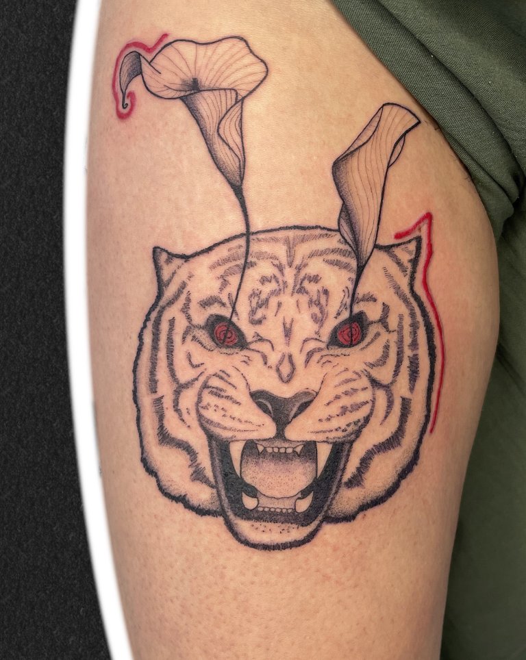 Tiger with calla lilies, upper arm tattoo by Alexandra S.